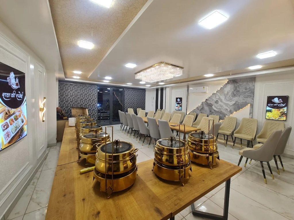 Radha Ki Rasoi restaurant with buffet setup and chandelier
